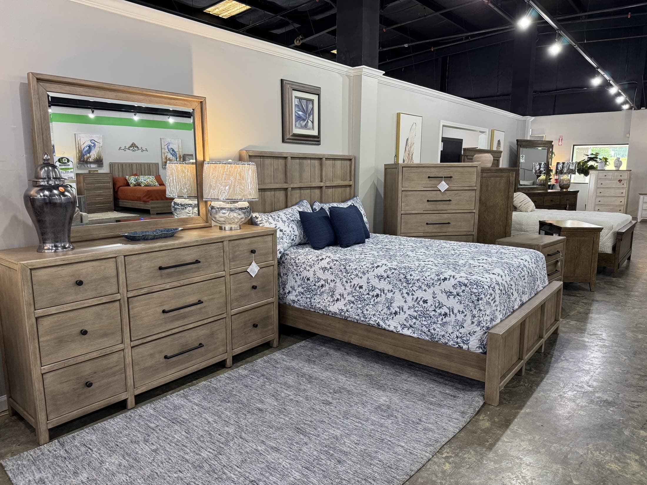 Driftwood-finish bedroom set with dresser, mirror and upholstered bed