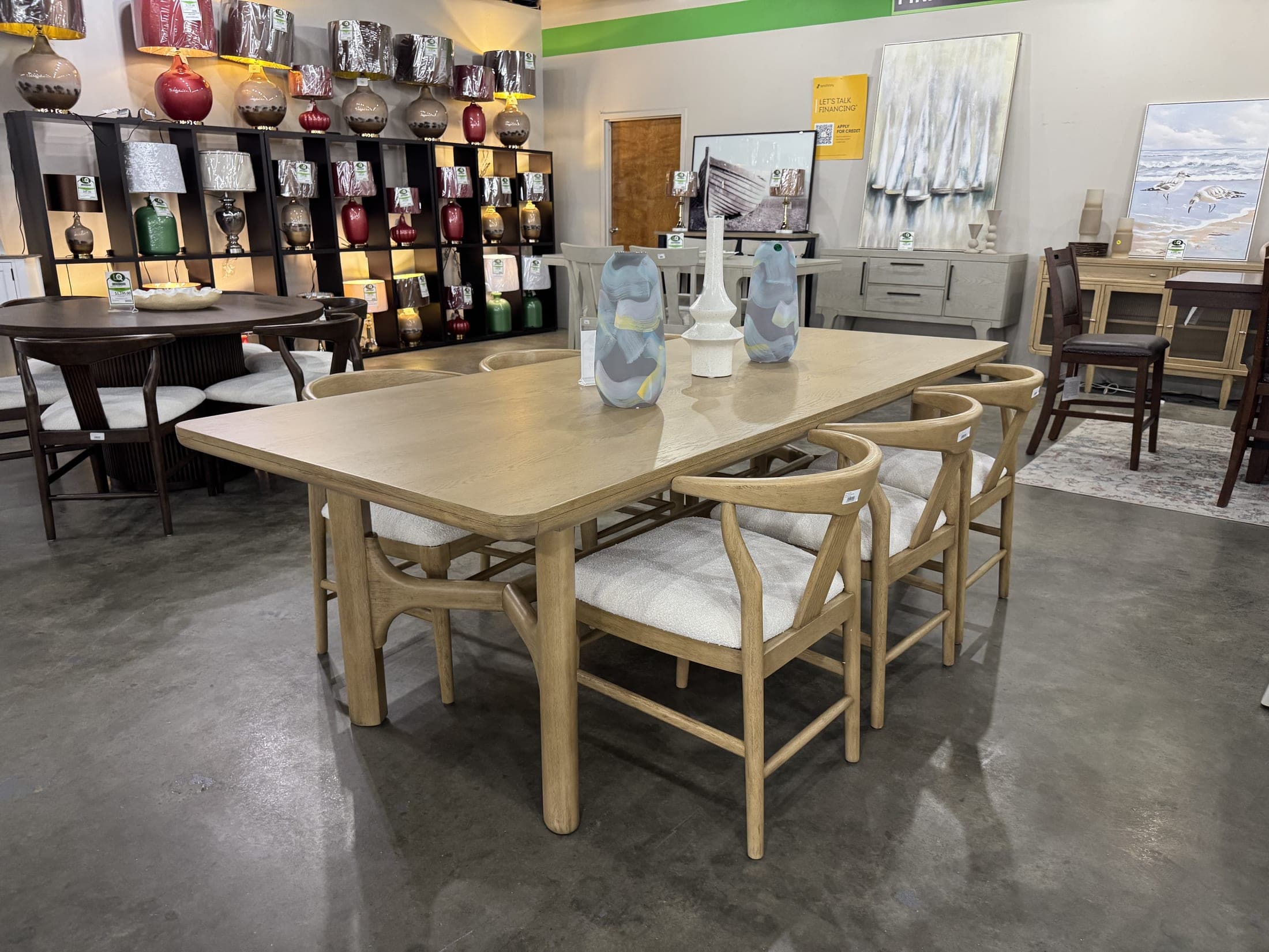 Light oak trestle table with woven-back chairs