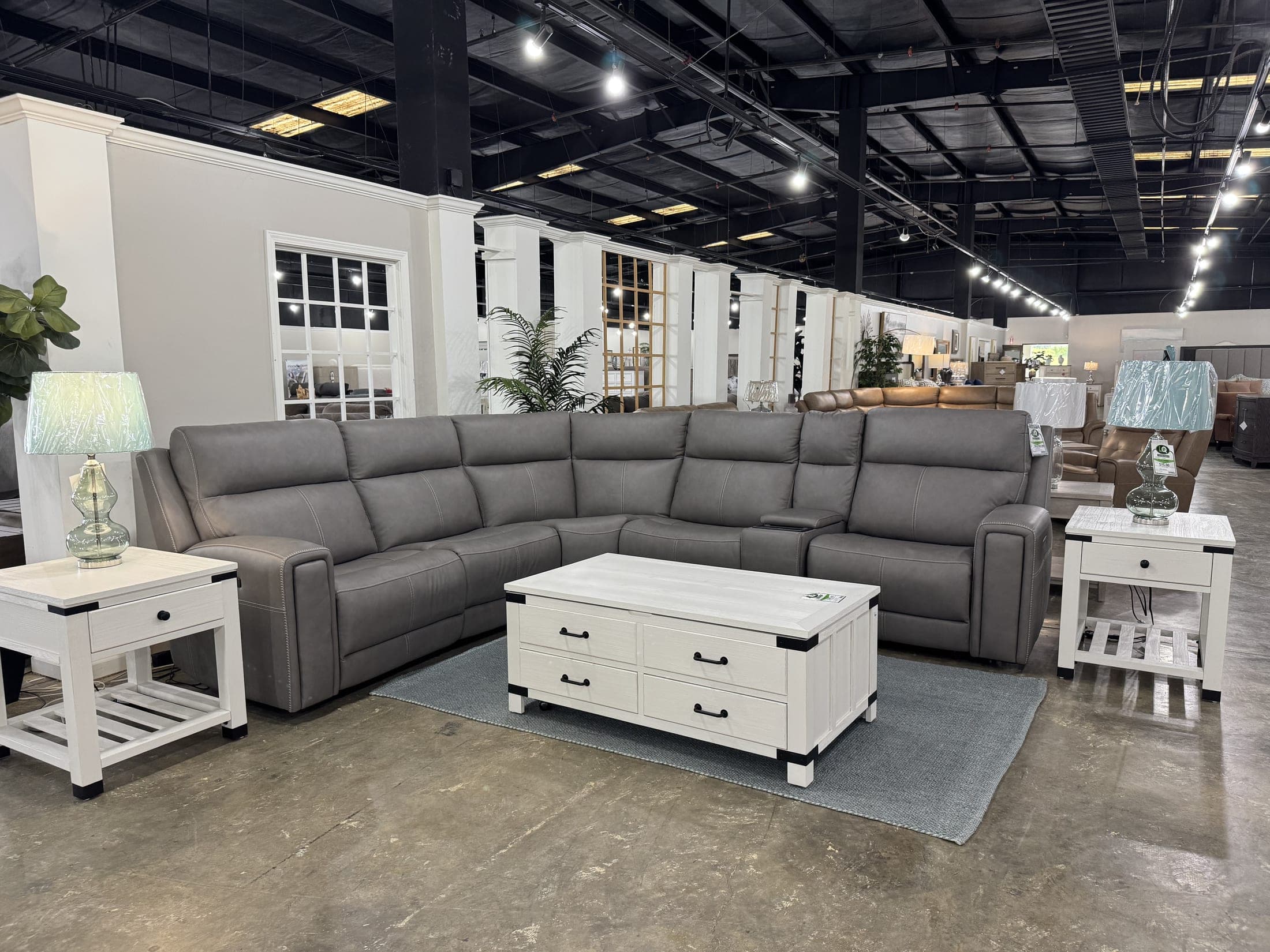 Gray sectional with white storage cocktail table